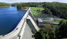 an aerial view of a dam and the water