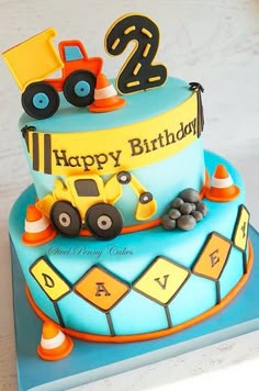 a birthday cake with a construction truck on top