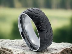 a motorcycle tire sitting on top of a rock