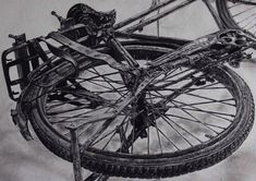 a pencil drawing of a bicycle with the front wheel still attached to it's frame