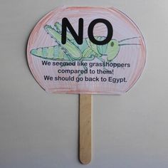 a stick with a sign on it that says no we sewed like grasshoppers compared to them