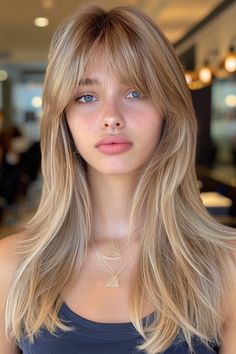 Elevate your style with 38 easy-to-maintain medium-length hairstyles featuring bangs—effortlessly chic and practical! ✨��💇‍♀️ #MediumLengthHair #HairstylesWithBangs #EasyMaintenance #ChicLooks #HairInspiration #EffortlessStyle Bangs With Round Face Long Hair, 90s Bubble Bangs, Blonde Hair With Full Bangs, Golden Blonde With Bangs, Long Layered Hair With Fringe Bangs, Blonde With Fringe Bangs, Choppy Fringe Bangs, Semi Bangs, Models With Bangs