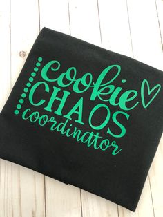 Who's ready for cookie chaos?! Here's to another wonderful year of hard work and dedication to our Girl Scouts! 💗 Writing is in blush pink glitter! Also available in other colors! Girl Scout Cookie Crafts, Girl Scout, Girl Scout Cookie Shirts Ideas, Girl Scout Cookie Booth Signs, Girl Scout Troop Shirts, Funny Girl Scout Cookie Signs, Girl Scout Cookies Funny, Girl Scout Shirts, Scouting For Girls