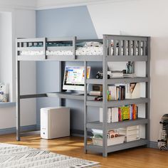 a bunk bed with desk and bookshelf next to it in a child's bedroom