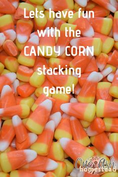 candy corn with the words let's have fun with the candy corn stacking game