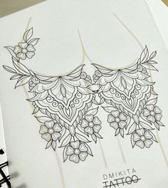 a drawing of two women's bras with flowers on them and the words minnesota tattoo