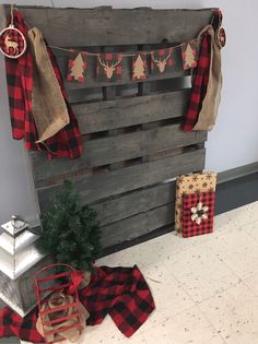 a wooden pallet with christmas decorations on it