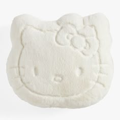 a white hello kitty pillow on a white background