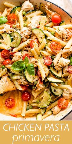 chicken pasta prima prima veggie with tomatoes and zucchini in a white bowl