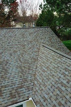 the roof of a house that has been gutted and is missing shingles on it