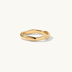 This subversive-basic stackable ring features a classic look with contemporary lines, giving it a free-form shape that sets the stage for undeniable glamor. Make room for the unexpected, a chance to showcase the free spirit within, flowing with a curvy silhouette made to symbolize freedom from the ordinary and hum-drum.

Band Width: 4mm
Band Thickness: 2mm
Material: 18k Gold Plated Titanium Formal Stackable Rings With Modern Twist, Modern Twist Stackable Adjustable Rings For Formal Events, Modern Twist Adjustable Stackable Rings For Formal Occasions, Adjustable Wavy Rings With A Modern Twist, Gold Curved Rings For Gifts, Curved Gold Rings For Gifts, Gold Curved Rings For Gift, 14k Gold Wavy Rings, Gold Wavy Promise Ring