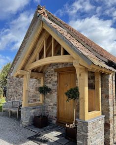 a small stone building with a wooden door