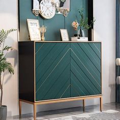 a green cabinet with gold trim on the front and sides, in a living room