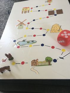 a board game with dices and other items on it