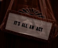 it's all an act sign in a plastic bag