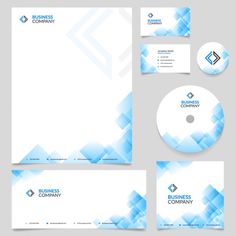 a set of stationery, business cards and envelopes with blue squares on them