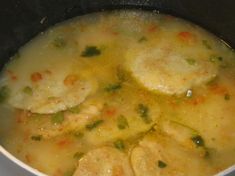 the food is being cooked in the pot on the stove top and ready to be eaten