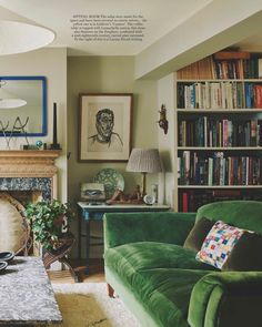 a living room filled with furniture and bookshelves