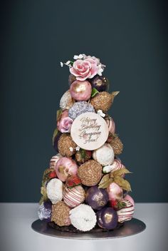 a christmas tree made out of chocolates and flowers