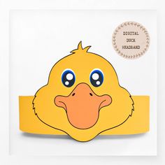 a paper cut out of a yellow duck with blue eyes