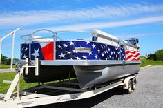 a boat with an american flag painted on it