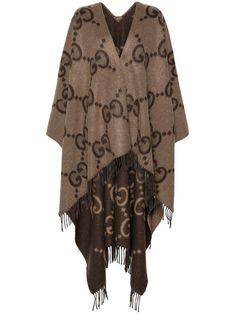 light brown brown cashmere knitted construction Jumbo GG jacquard reversible logo patch to the rear open front sleeveless fringed edge asymmetric hem Cape Designs, Cashmere Cape, Wool Poncho, Cashmere Color, Cashmere Wrap, Dolce E Gabbana, Jacquard Knit, Italian Fashion, Stylish Men