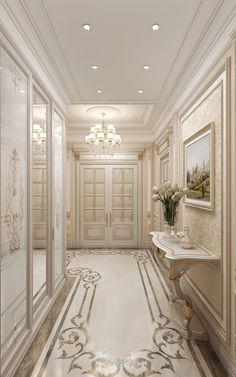 an elegant bathroom with marble flooring and chandelier on the ceiling, along with white walls