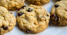 a white plate topped with lots of cookies