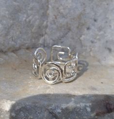 "✧ Greek key and spiral combo hammered ring in Sterling silver by BIOS jewelry ✧ ◆ This delicate adjustable ring handmade with care in our workshop in Greece, features the Meander or Greek key motifand spiral two of the most beautiful and important symbols in Ancient Greece. ◆ The continuous interlocking lines and repeated motif reflects the fluid movement of the ocean wave, and thus the eternal flow of things, the meandering of life. ≈ Greek key symbolizes ◆ Unity ◆ Infinity ◆ Everlasting bonds Spiral Jewelry, Greek Ring, Fluid Movement, Hammered Jewelry, Wife Jewelry, Unique Silver Jewelry, Spiral Ring, Hammered Ring, Hammered Earrings