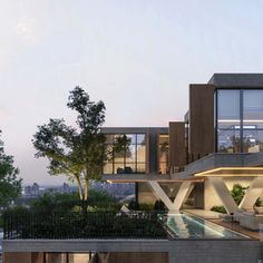 an architectural rendering of a modern house with trees and bushes in the foreground at dusk