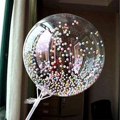 a large clear bubble filled with lots of candy