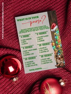 a christmas ornament with a price list on it next to a red sweater