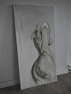 a painting is shown in an empty room