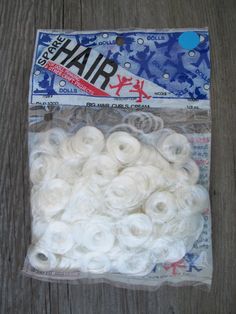 Here is a listing for a package of .50 oz (1/2 ounce) of "Big Hair Curls" doll hair for use in doll's hair, animals and soft craft projects.  From Nicole Crafts (Stock No. DLP1002); this is a store "New Old Stock" and unused item, still sealed in the original packaging.   Easy to use - application instructions are on the back of the package (2nd photo). This is the large curl style of doll hair as demonstrated in the 3rd close-up photo. It's in a cream color; more of an off-white tone. Wonderful for holiday and year round uses.  Great especially for Santa projects.  It's a nice package of sealed curls...easy to apply and ready to be used on your doll or craft project! About Combination Shipping: my shop policy is to always combine shipping. Shipping overpayments are refunded back into the Big Hair Curls, Large Curls, Hair Curls, White Tone, Curl Styles, Curl Cream, Doll Parts, Doll Hair, Close Up Photos