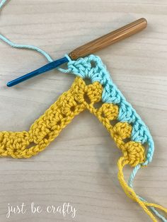 the crochet stitch is being worked on