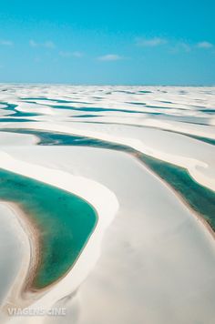 an aerial view of the water and sand dunes at low tide beach, florida keys