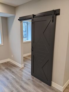 Walston Door Company Painted Door Painted Modern Arrow Door Herringbone Door, Grey Hallway, Farm Door, Contemporary Interior Doors, Painted Interior Doors, Pocket Door, Solid Doors, Kitchen Wall Tiles, Kansas City Missouri