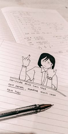 a pen sitting on top of a piece of paper next to a drawing of a woman