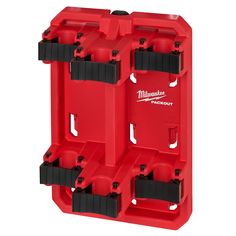 two red milwaukee tool storage containers with black handles and one holding three holes for tools