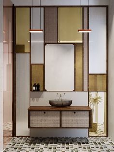 a bathroom with a sink, mirror and lights on the wall next to a tiled floor