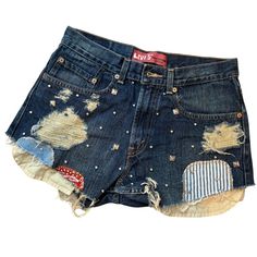 💖These small studded shorts offer a unique blend of vintage charm and hippie flair. Small Studded Shorts Levis Patchwork  Distressed Denim Jeans Shorts Rework Waist 30 Vintage Hippie. SIZE  Waist-30" Hip-36" Rise-11 " 💖Don't worry if you like this design and need it in your size--we can customize it for you.  Made to order : additional time 2-3 WEEKS Please providing detailed information about the size and materials you prefer for your custom handmade jeans, consider the following: -Waist meas Denim Jean Shorts For Festival, Distressed Cutoff Bottoms For Festival, Cutoff Denim Shorts For Festival, Festival Distressed Short Bottoms, Vintage Bottoms With Patches For Summer, Distressed Cotton Shorts For Festival, Denim Shorts With Patches In Short Length, Denim Cutoff Shorts For Festivals, Grunge Short Jeans With Pockets