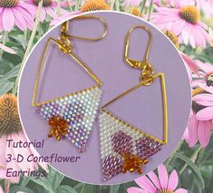 the earrings are made with seed beads and beaded in gold, silver, and pink