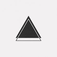 a black triangle on a white background