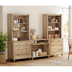 an open bookcase with drawers and shelves in a living room next to a dining room table