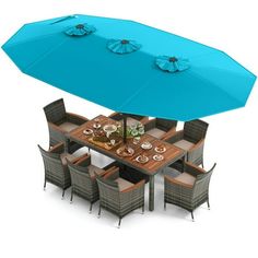 an outdoor dining table with blue umbrella over it and six chairs around it, all set up for four people