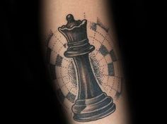 a black and white tattoo of a chess piece