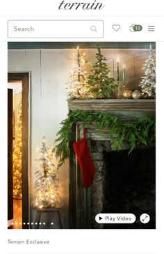 an image of a fireplace decorated with christmas trees and stockings on the mantels