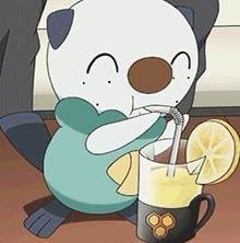 a cartoon bear drinking from a cup with a lemon slice on the rim next to it