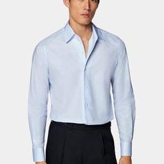 Find the height of spring style & comfort in this breezy light blue shirt. Tailored slim with ultra-fine stitching, a softly structured collar, and a sleek, semi-tailored waist for a casually polished silhouette. Light Blue Slim Fit Collared Top, Light Blue Slim Fit Collared Shirt, Slim Fit Light Blue Collared Shirt, Light Blue Long Sleeve Dress Shirt For Spring, Formal Slim Fit Light Blue Shirt, Blue Slim Fit Shirt For Semi-formal Occasions, Light Blue Slim Fit Top With Spread Collar, Blue Slim Fit Shirt For Office, Fitted Light Blue Dress Shirt For Spring