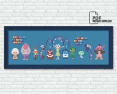 a cross stitch pattern with monsters and other cartoon characters on it, in front of a white brick wall